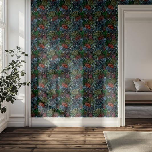 Room with a colorful patterned botanical wallpaper and a sofa in the background
