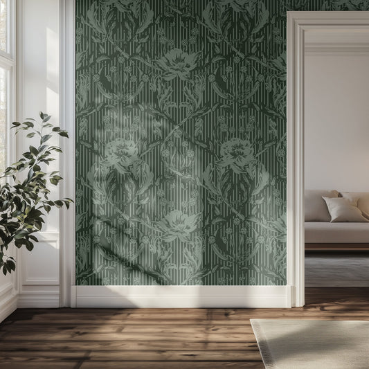 Hallway with green stripe and floral wallpaper, plant, and sofa.