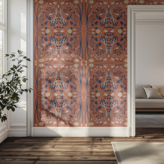 Decorative tapestry with a floral pattern in a room with a couch and plant.