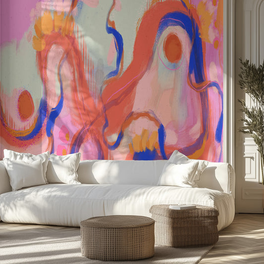 Modern living room with a colorful abstract mural on the wall.