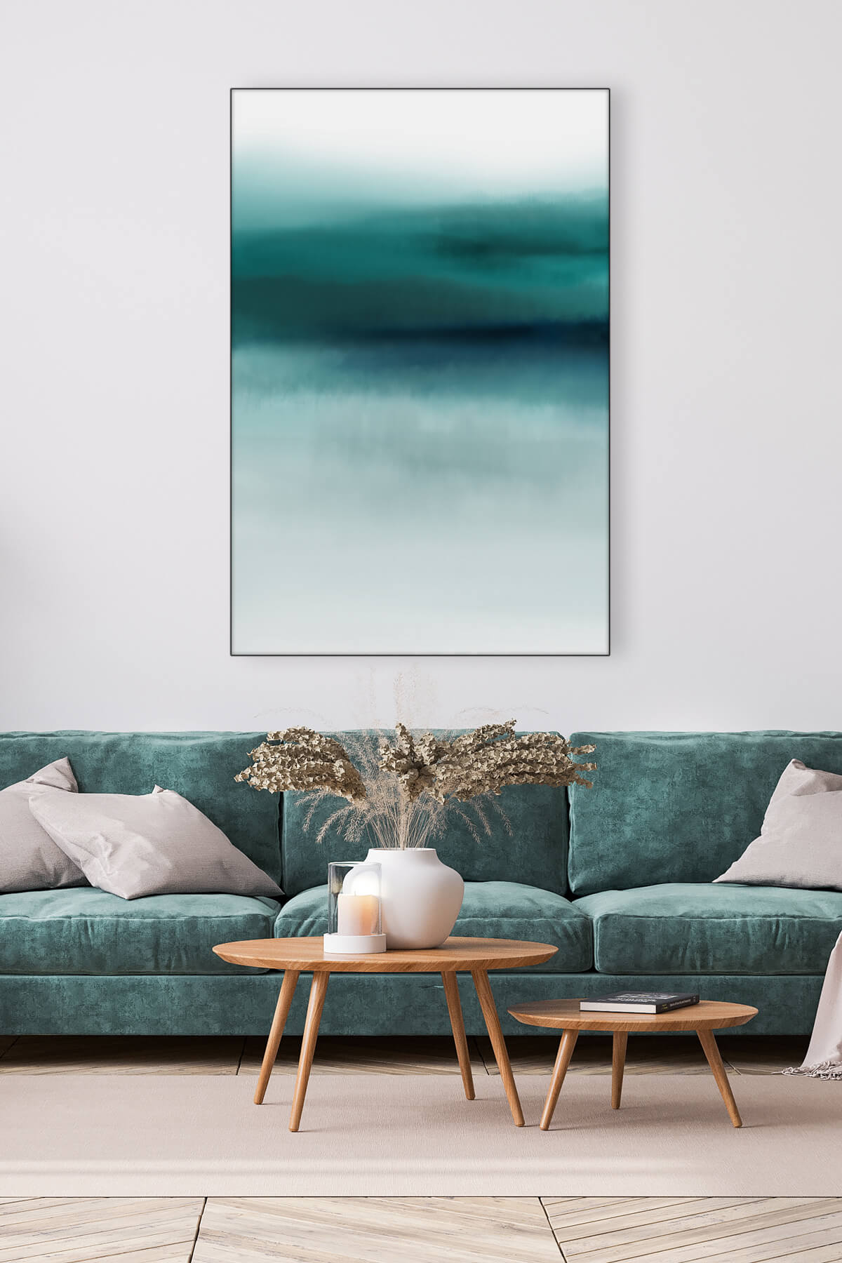 Contemporary living room features teal blue abstract artwork hanging on white wall above blue couch on white wall.