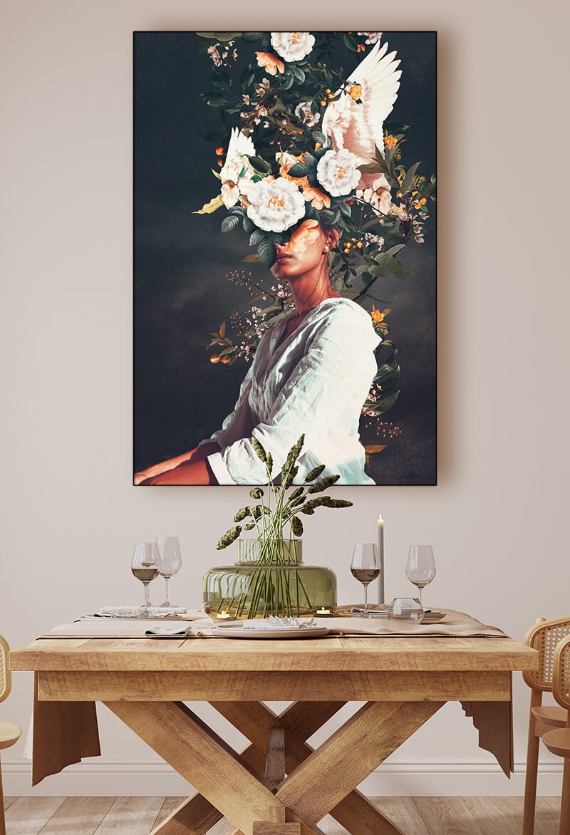Massive surreal flower head wall art hangs in kitchen above dinning room table.