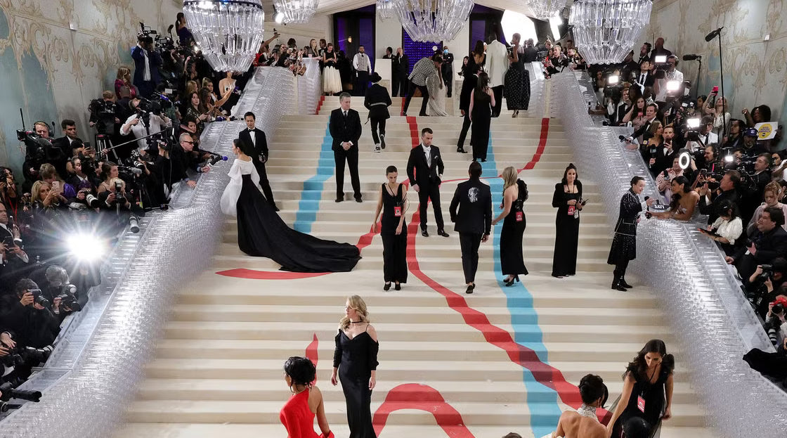 met gala red-carpet entrance with celebrities and paparazzi