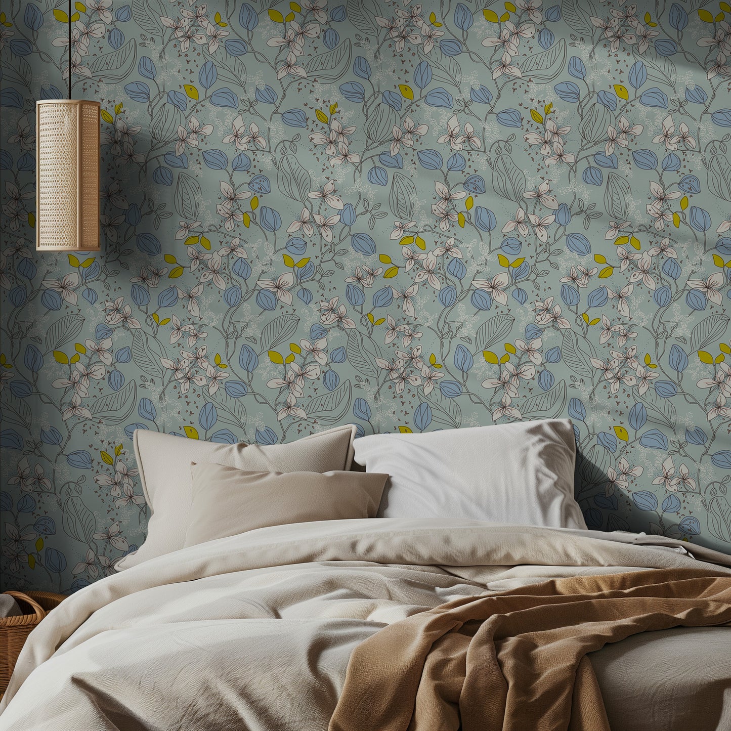 Bedroom with aqua and blue floral wallpaper and beige bedding.