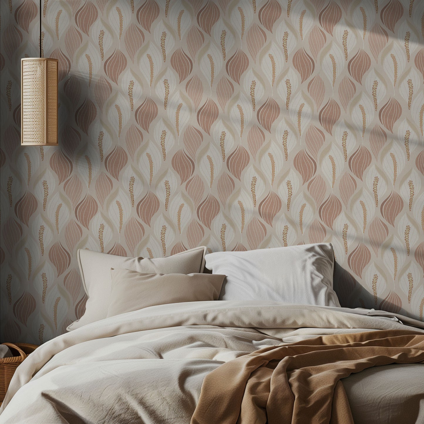 Bedroom with warm, beige and dusty rose Lilly patterned wallpaper and soft bedding