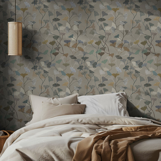 Bedroom with neutral earthy leaf wallpaper pattern and soft bedding.