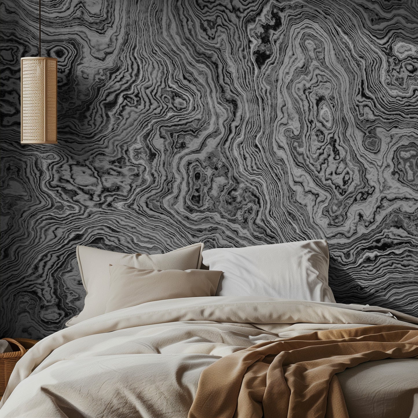 Bedroom with a textured gray marble wall mural and neutral bedding