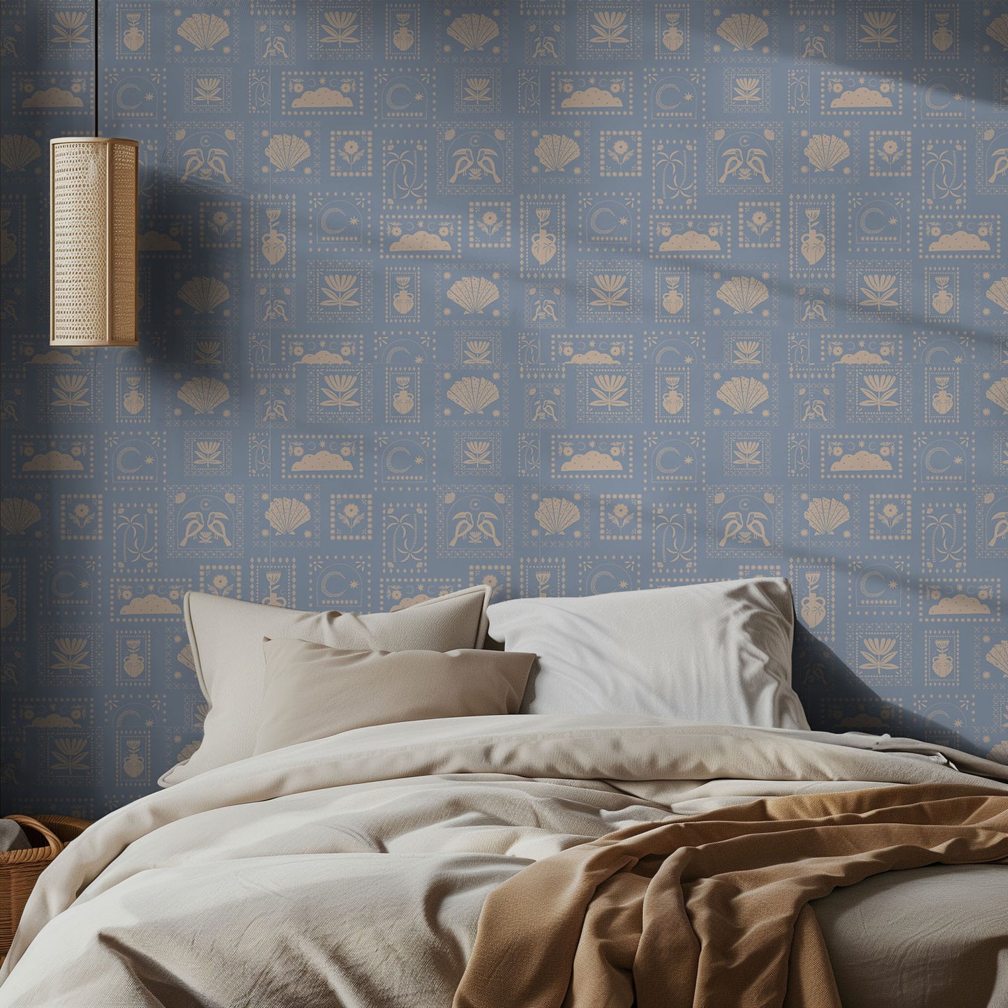Bedroom with blue and white postage stamp patterned wallpaper featuring geometric patterns and a lamp on the wall.
