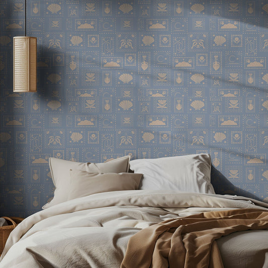 Bedroom with blue and white postage stamp patterned wallpaper featuring geometric patterns and a lamp on the wall.