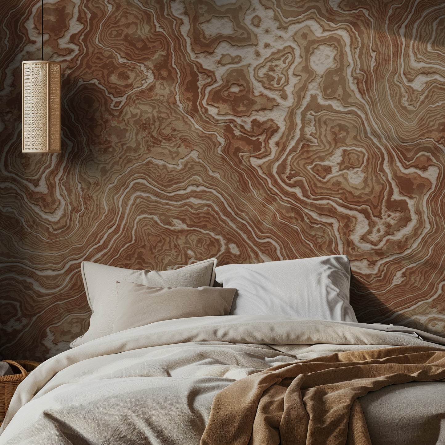 Bedroom with brown marble-patterned wall and soft bedding