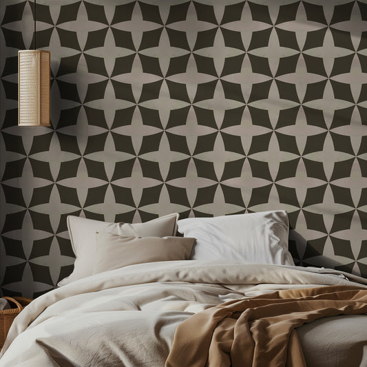 Bedroom with neutral and brown diamond geometric patterned wallpaper and neutral bedding.