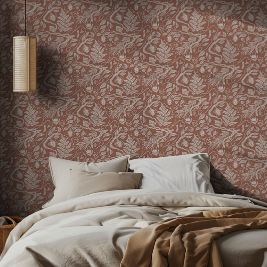 Bedroom with boho brown and white foliage patterned wallpaper and neutral bedding.
