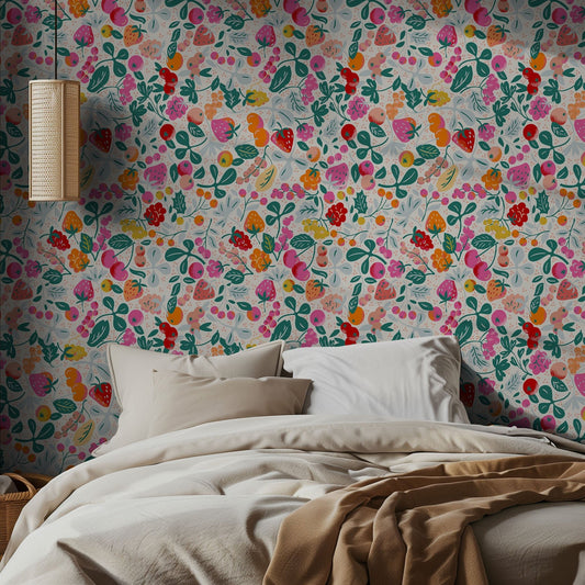 Bedroom with vibrant illustrated fruit wallpaper and beige bedding.