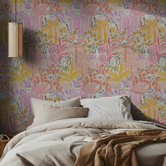 Bedroom with colorful lemur-patterned wallpaper and soft bedding.