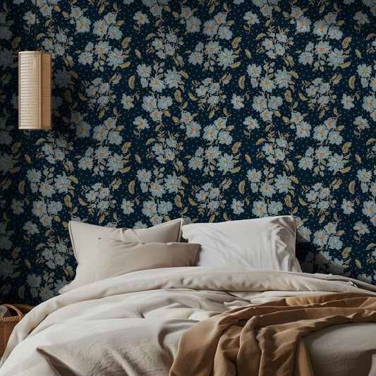 Bedroom with dark blue floral and polka dot wallpaper and beige bedding
