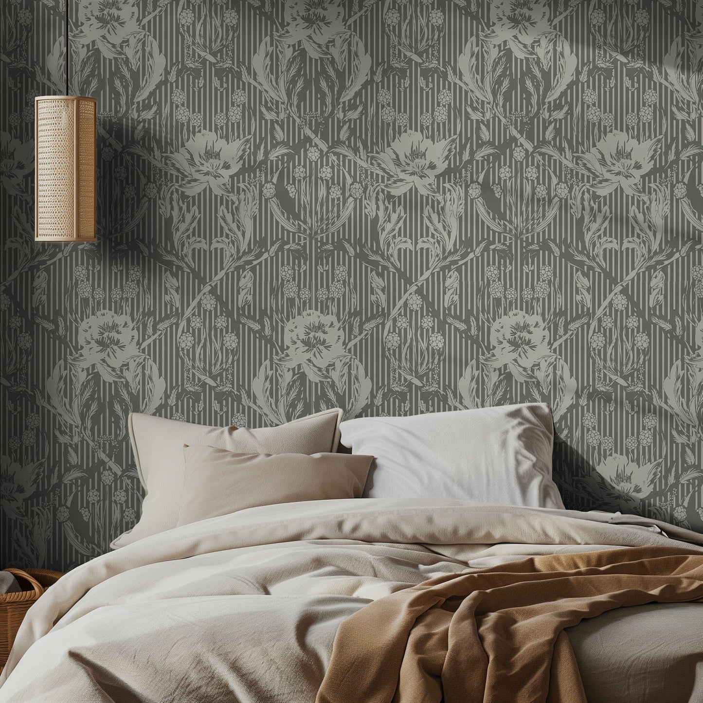 Bedroom with forest green, vintage floral patterned wallpaper and soft bedding