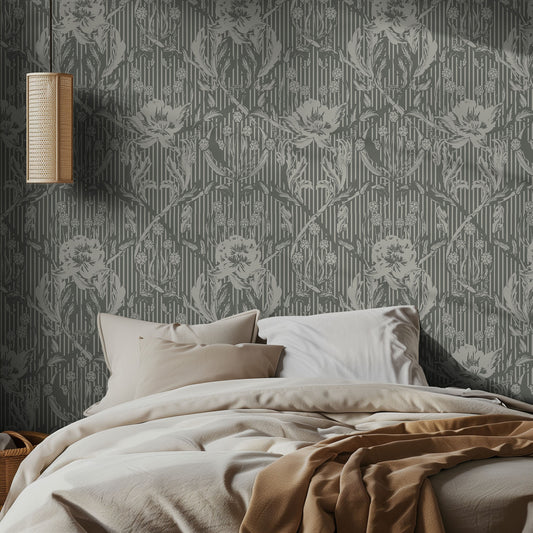 Bedroom with forest green, vintage floral patterned wallpaper and soft bedding
