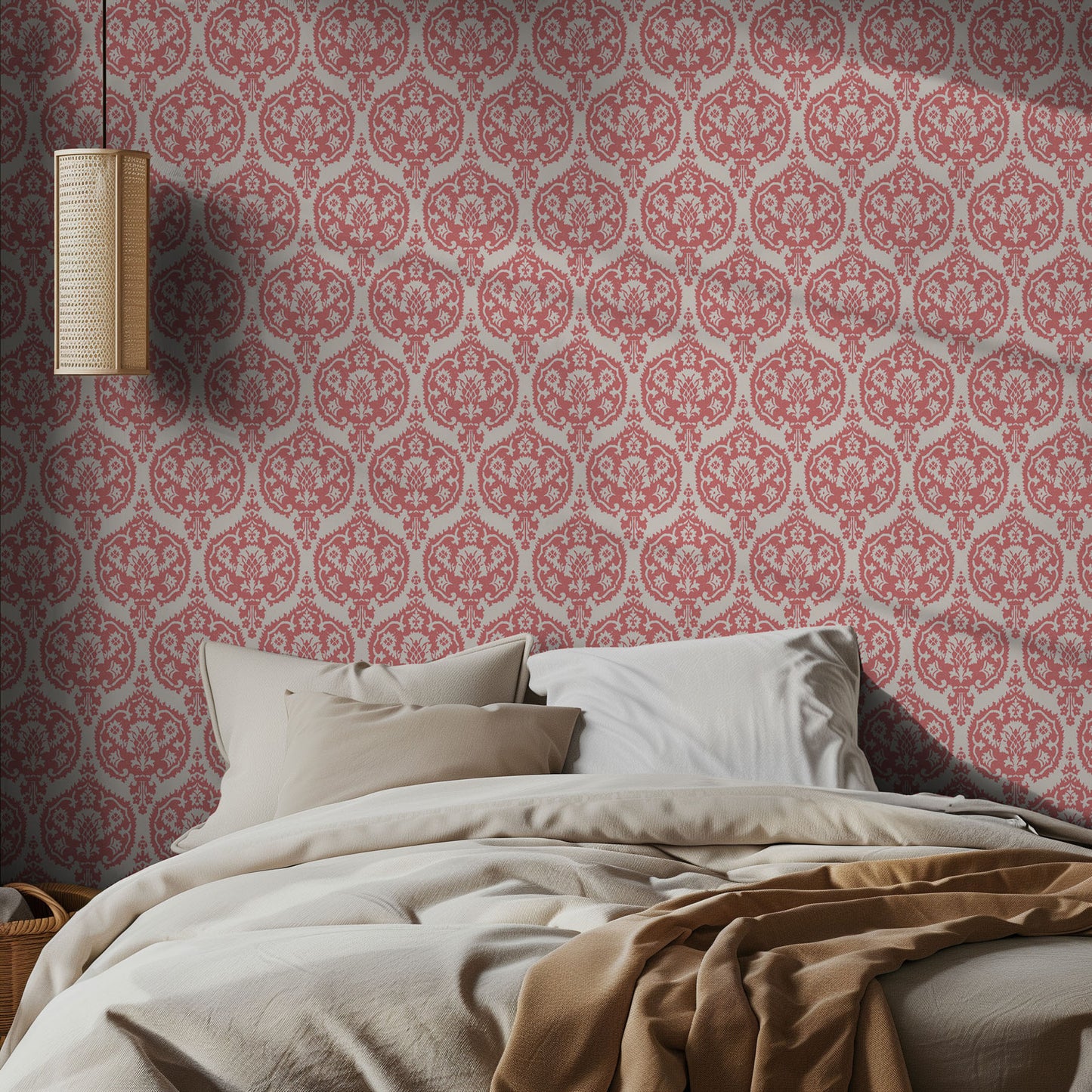 Bedroom with pink and white damask patterned wallpaper and neutral bedding