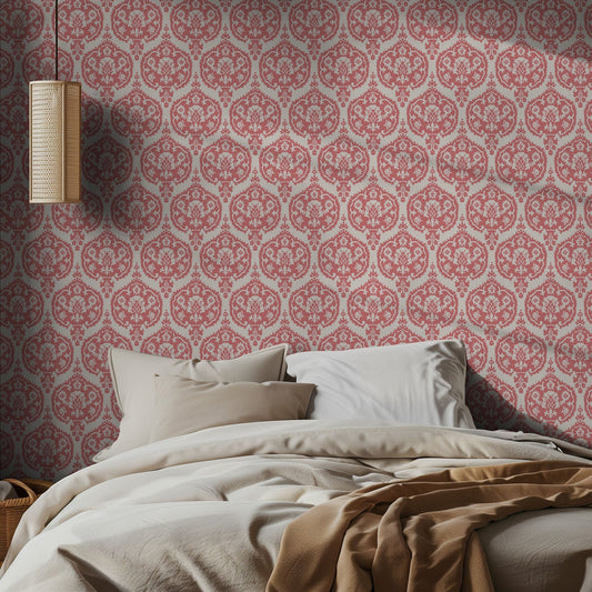 Bedroom with pink and white damask patterned wallpaper and neutral bedding