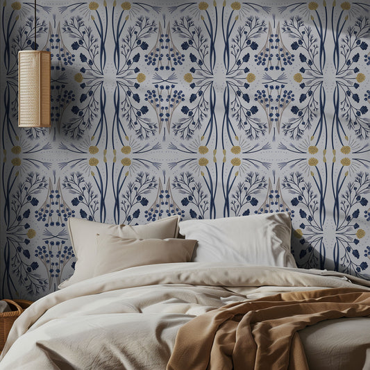 Bedroom with boho wildflower patterned wallpaper and a bed with beige bedding.