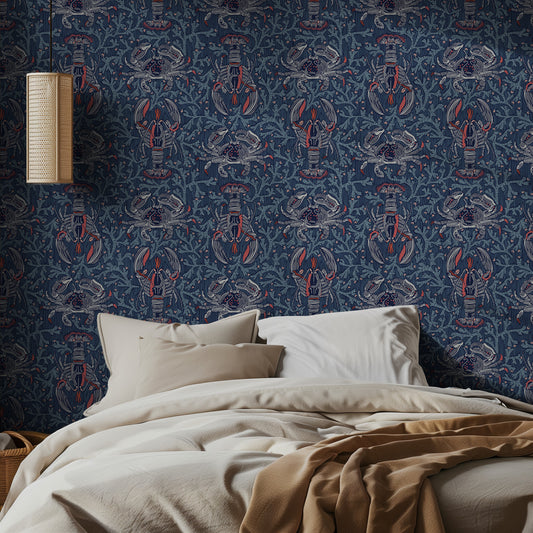 Bedroom with blue wallpaper featuring crab patterns and a bed with beige bedding.