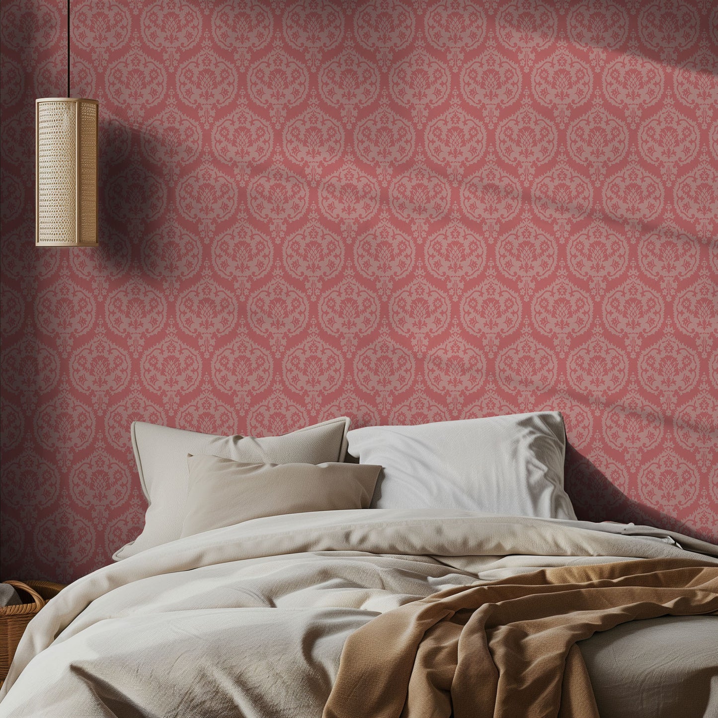 Bedroom with pink damask patterned wallpaper and beige bedding