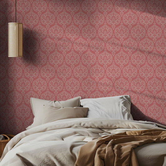 Bedroom with pink damask patterned wallpaper and beige bedding