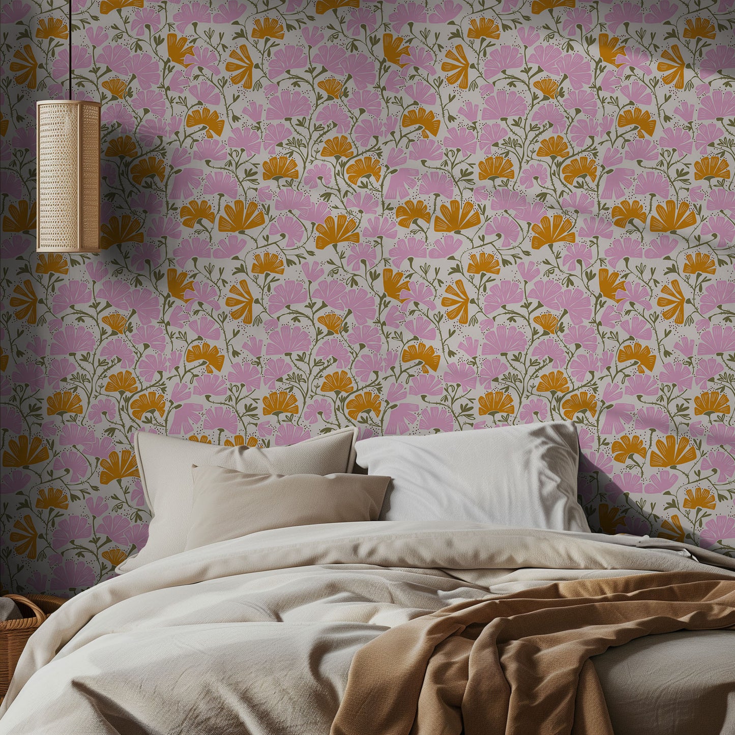 Bedroom with floral wallpaper featuring pink and orange flowers, and a lamp on the wall.