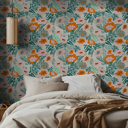 Bedroom with vibrant floral wallpaper and a bed with beige bedding.