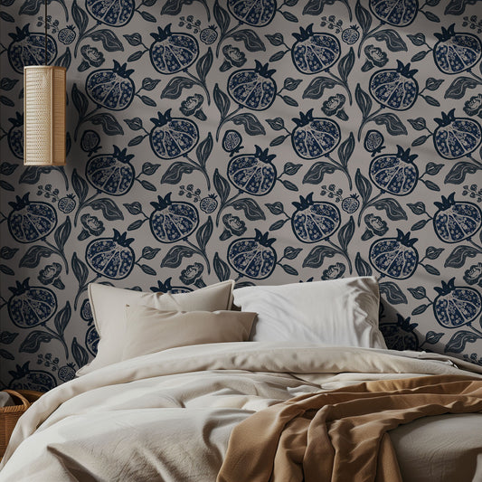 Bedroom with pomegranate patterned wallpaper and beige bedding