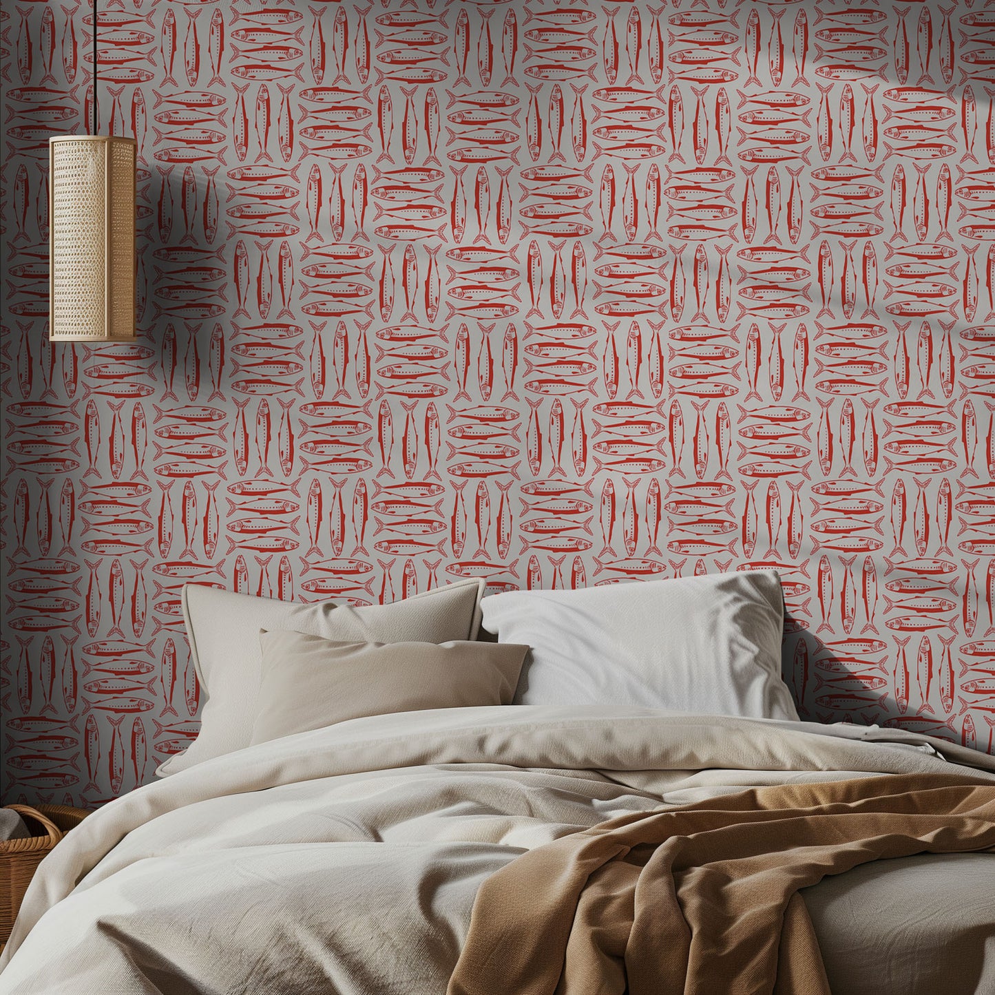 Bedroom with red sardine patterned wallpaper and beige bedding