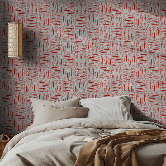 Bedroom with red sardine patterned wallpaper and beige bedding