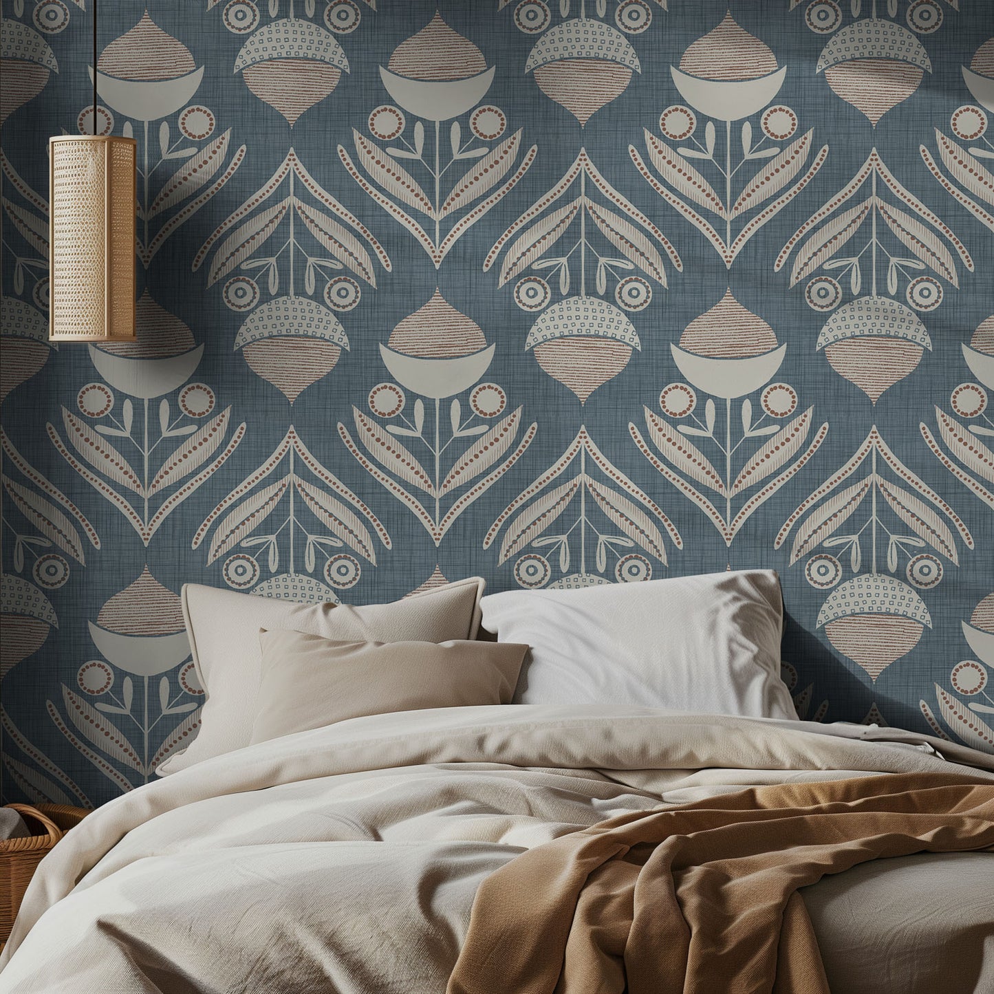 Bedroom with light blue boho patterned wallpaper and a bed with beige bedding.