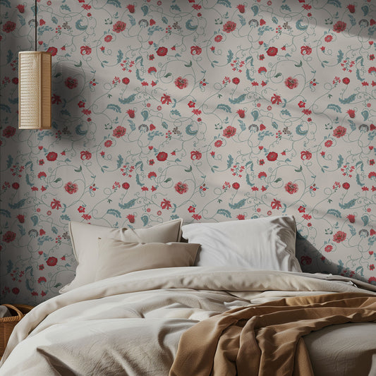 Bedroom with floral wallpaper and a bed with beige bedding.