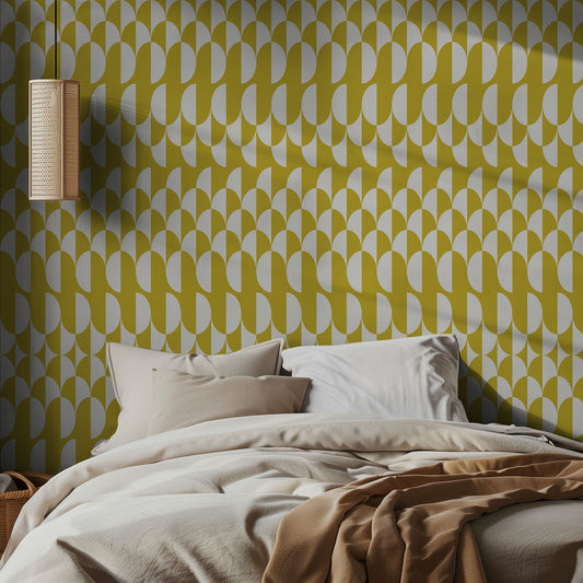 Bedroom with yellow geometric wallpaper and beige bedding
