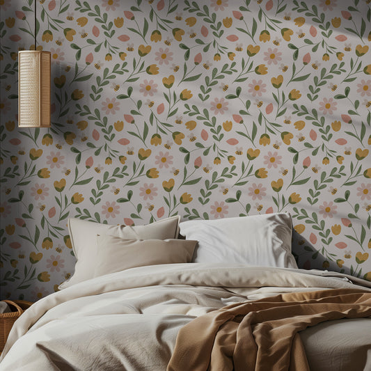 Bedroom with a springy floral wallpaper and a bed with beige bedding.