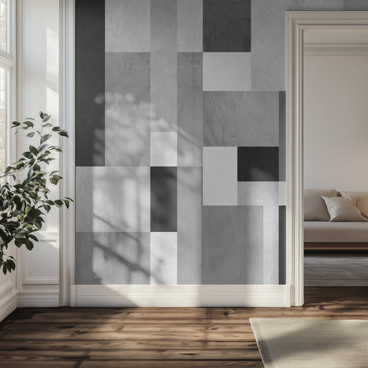 Modern interior with geometric-patterned monochrome wall mural, plant, and sofa.