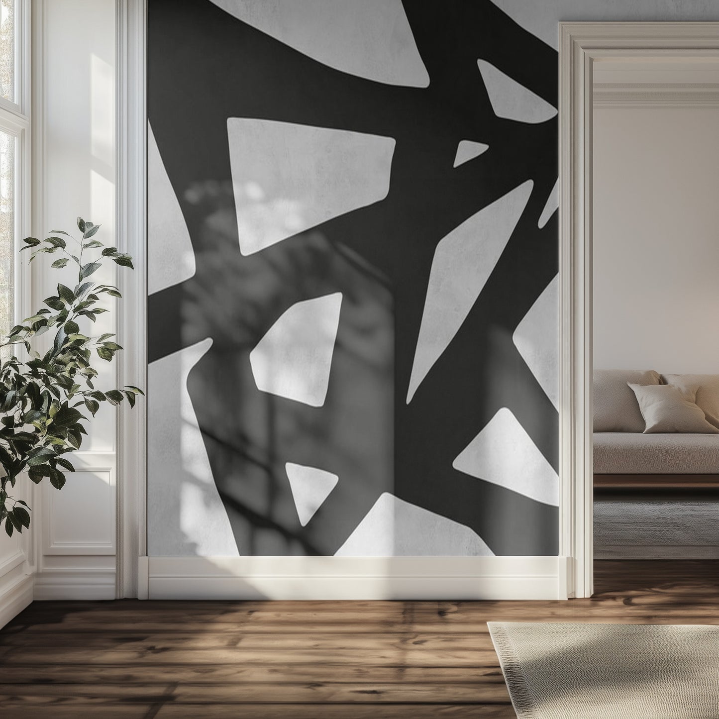 Modern interior with abstract black and white wall art mural in a living room.