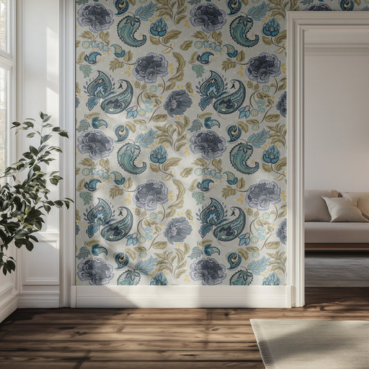 Hallway with floral and paisley wallpaper and a couch in the background.
