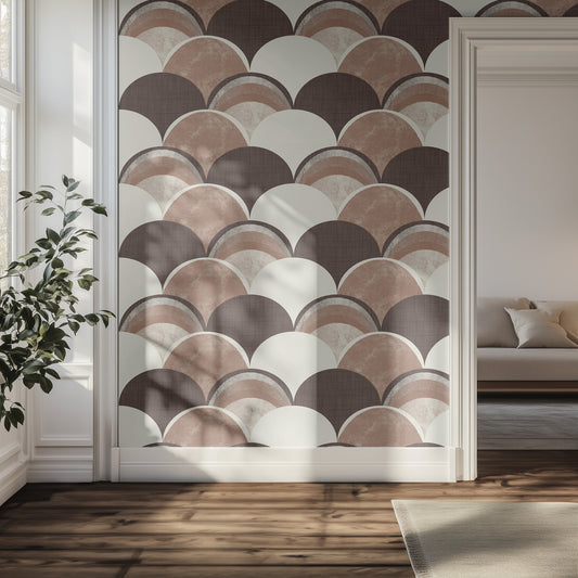 Modern hallway with a textured, brown, geometric patterned wall, plant, and sofa.