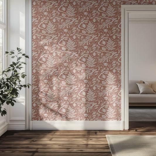 Hallway with brown and white patterned boho wallpaper, plant, and sofa.