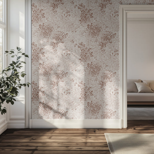 Room interior with a decorative wall panel with animal print wallpaper and a couch in the background