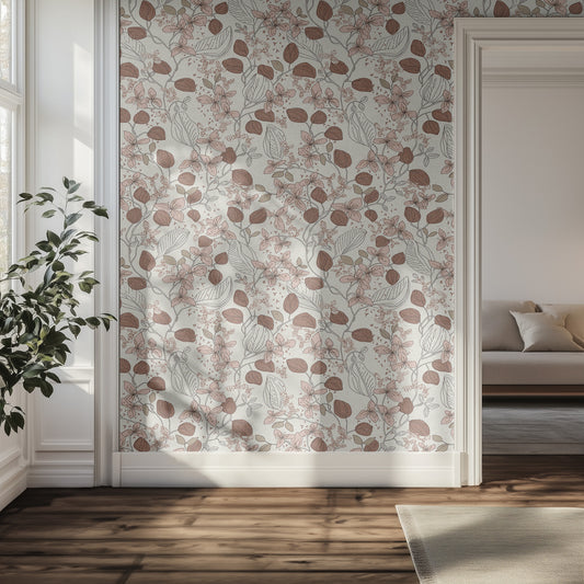 Hallway with brown and dusty rose floral patterned wallpaper, wooden floor, and a plant.