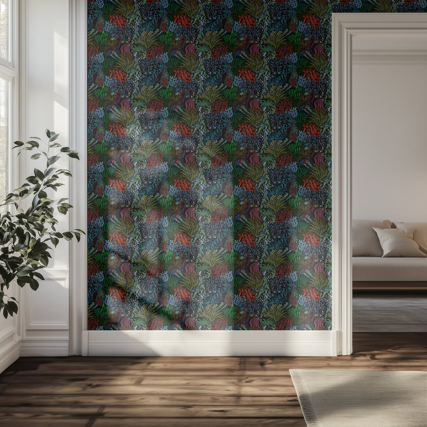 Room with a colorful patterned botanical wallpaper and a sofa in the background