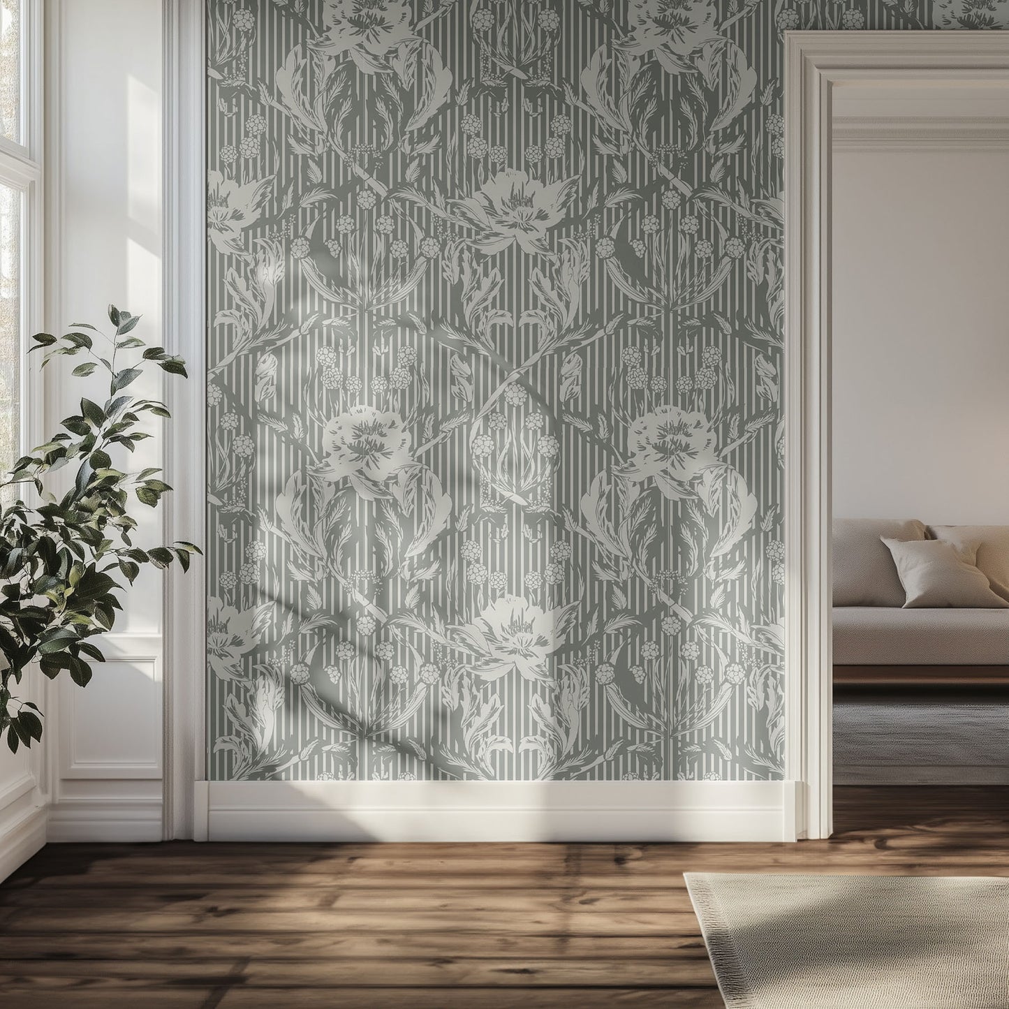 Hallway with forest green and cream floral patterned wallpaper, plant, and sofa.