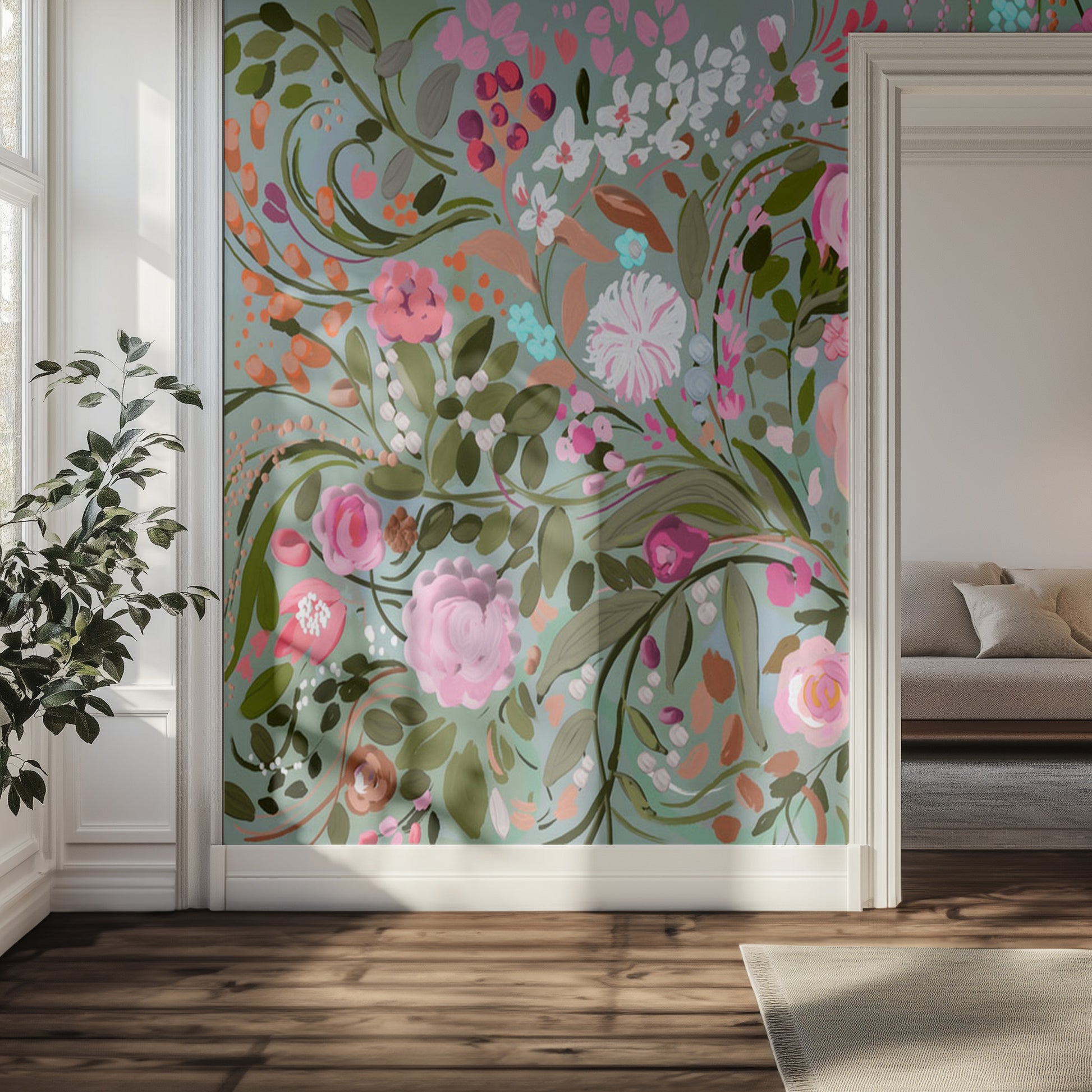 Floral wallpaper mural with pink and green flowers in a room with a couch and plant.