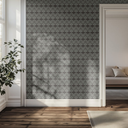 Geometric patterned wallpaper in a hallway with a plant.