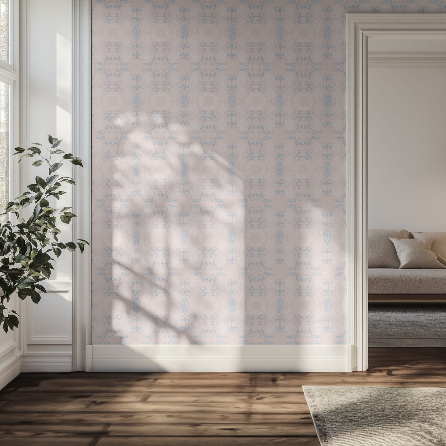 Hallway with pastel pink and light blue geometric wallpaper, plant, and sofa