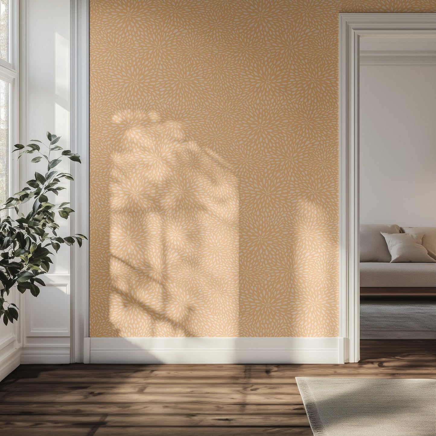 Living room with orange floral wallpaper, plant, and sofa