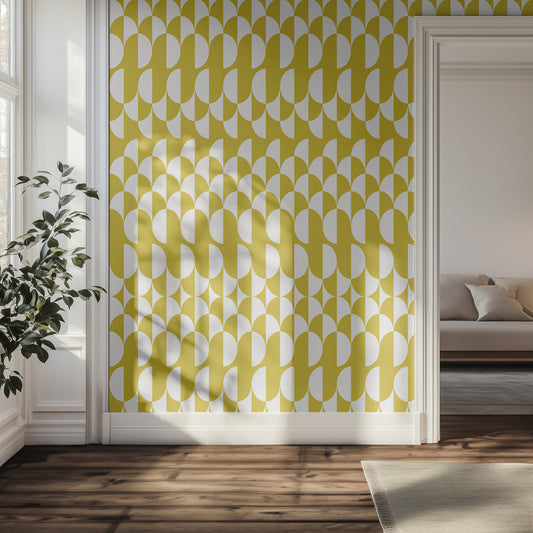 Living room with yellow geometric wallpaper, plant, and sofa